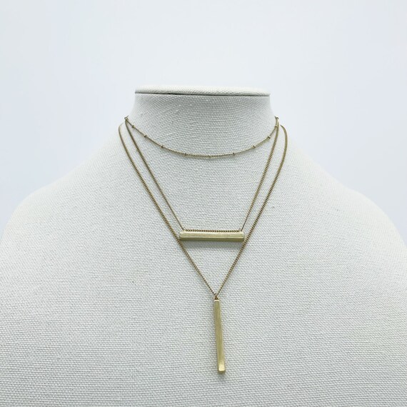 Multi Chain Soft Gold Necklace With Bar Charms - image 2