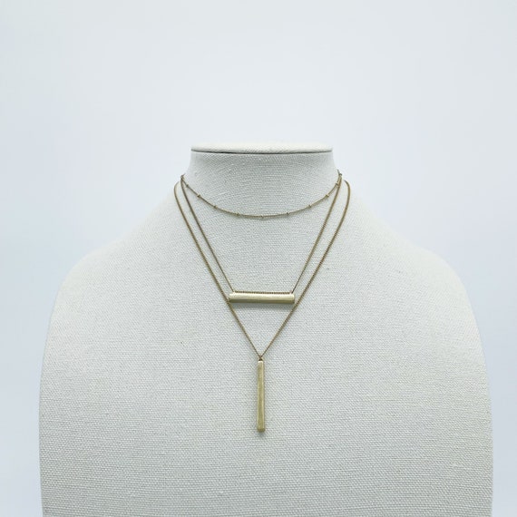 Multi Chain Soft Gold Necklace With Bar Charms - image 1