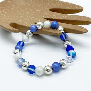Blue and Pearly White Opalescent Beaded Stretch with Crystal Accent