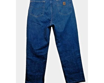 Calça jeans Carhartt vintage anos 90, tamanho 36x29, azul, lavagem média, estilo workwear baggy.