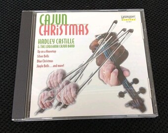 El CD Cajun Christmas (Delta) de 1997, con la participación del artista Hadley J. Castille.