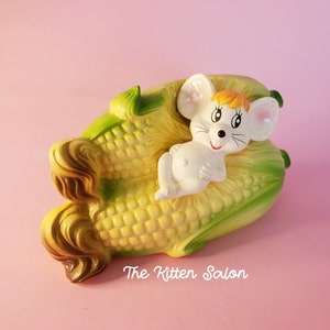 Vintage mouse lounging on corn cobs money bank, Japan