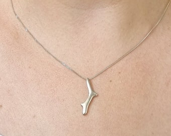 Necklace with coral branch worked out in silver. Length of the necklace 45 cm, solid cast coral branch 3 cm