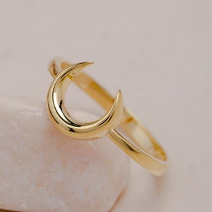 Delicate celestial moon ring in a minimalist style