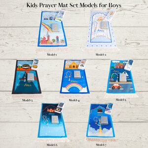 May include: A collection of seven prayer mat sets for boys, each featuring a unique design with a matching prayer book and accessories. The mats are in various colors, with illustrations of landmarks, rainbows, and vehicles. The text "Kids Prayer Mat Set Models for Boys" is at the top.