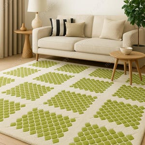 May include: A cream-colored rug with a repeating pattern of lime green diamond shapes. The rug is placed in a living room setting with a beige sofa, pillows, and wooden side tables. A lamp and a plant are also visible.