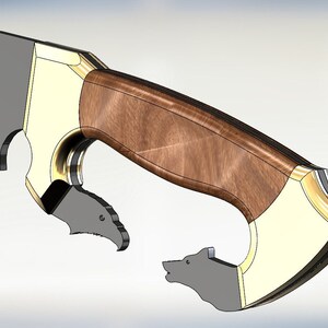 May include: A close-up of a knife handle with a wooden inlay and gold accents. The handle features two wolf head cutouts on either side.