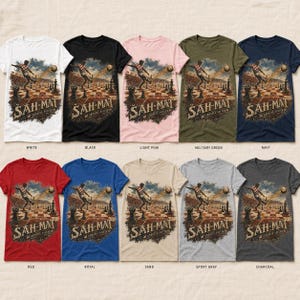 May include: A collection of ten short-sleeve t-shirts in various colors, each featuring a graphic print of a soccer player kicking a ball over a chessboard. The text "&Scaron;AH-MAT" and "CROATIA SOCCER" is printed below the illustration on every shirt.