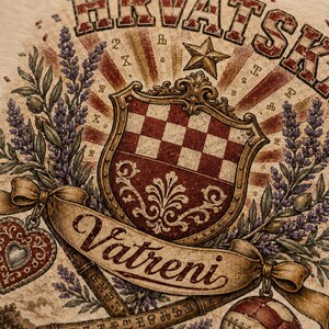 May include: A graphic print featuring the text HRVATSKI and Vatreni, a red and white checkered shield, a star, lavender sprigs, a heart-shaped ornament, and a soccer ball. The design uses a vintage aesthetic with muted tones of red, brown, and cream.
