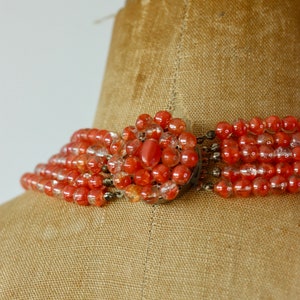 1950s Peach glass beaded 5 stand necklace//Flower closure//New old stock.