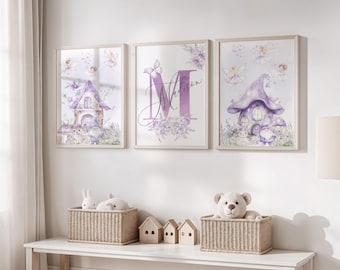 May include: Three framed watercolor prints with a fairy theme. The prints feature a purple fairy house, fairies, and a large letter with a name. The artwork is in soft pastel colors, with a whimsical and dreamy aesthetic.