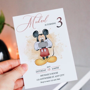 May include: A birthday invitation featuring Mickey Mouse taking a selfie. The invitation is for Michael's 3rd birthday party. The party is on Saturday, October 15th at 4:00 PM at Michael's house. The address is 123 Anywhere St., Any City. RSVP to mom at 123 456 7890.