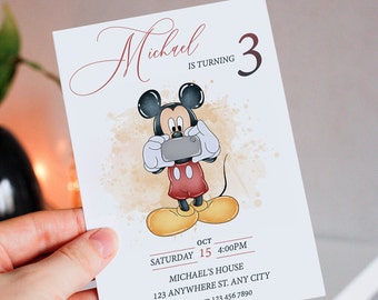 May include: A birthday invitation featuring Mickey Mouse taking a selfie. The invitation is for Michael's 3rd birthday party. The party is on Saturday, October 15th at 4:00 PM at Michael's house. The address is 123 Anywhere St., Any City. RSVP to mom at 123 456 7890.