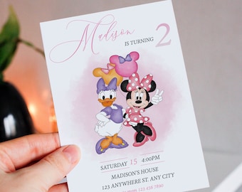 May include: A party invitation featuring Minnie Mouse and Daisy Duck with balloons. The invitation reads "Madison is turning 2" in pink script, with event details below. The background has a soft pink watercolor effect.