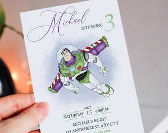 May include: A birthday invitation featuring a cartoon illustration of Buzz Lightyear from the Toy Story movie franchise. The invitation is for a boy named Michael who is turning 3 years old. The text on the invitation reads "Michael is turning 3" and includes the date, time, and location of the party.