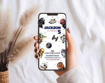 May include: A Star Wars themed birthday invitation for a 5 year old boy named Jackson. The invitation features a white background with colorful stars and various Star Wars characters, including Darth Vader, Yoda, R2-D2, and Chewbacca. The text on the invitation reads "Jackson is turning 5" and includes the date, time, and location of the party.
