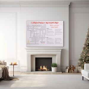 May include: A white framed Christmas crossword puzzle with the title "Christmas Crossword" and the text "Sing and Solve" and "Porter Family". The puzzle is set against a white wall with a fireplace and a decorated Christmas tree.