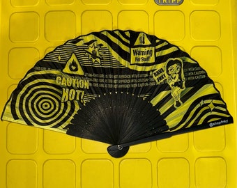 Hot Stuff Funky Fan - yellow and black danger/caution/warning print bamboo foldable hand fan.