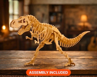 May include: A light brown wooden model of a Tyrannosaurus Rex skeleton featuring interlocking pieces that form the skull, rib cage, spine, and limbs. The structure is displayed in a standing position with the text ASSEMBLY INCLUDED visible below.