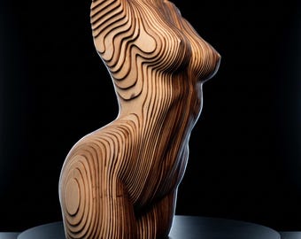 May include: A sculpture of a human torso constructed from stacked layers of light and dark wood. The piece features a contoured, topographical design with visible horizontal lines that follow the curves of the chest, waist, and hips.