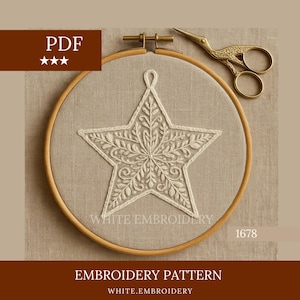May include: A detailed white embroidered star on beige fabric, held in a wooden embroidery hoop. The star has a floral design. Gold-coloured scissors are placed next to the hoop. The image includes the text "WHITE EMBROIDERY" and "EMBROIDERY PATTERN".