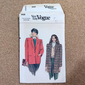 May include: Vogue Patterns sewing pattern envelope. The envelope features illustrations of two women wearing blazers. The text on the envelope reads "Very Easy Vogue" and "8426". The size is indicated as (6-8-10).