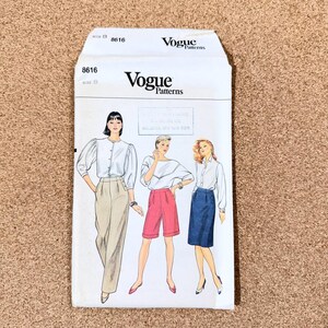May include: Vogue Patterns sewing pattern envelope, featuring illustrations of women's clothing designs. The envelope is white with the Vogue Patterns logo and the number 8616. The designs include a blouse, shorts, and a skirt.