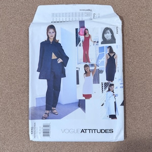 May include: A Vogue Attitudes sewing pattern envelope featuring images of women modeling various clothing designs. The envelope is white with the number "1770" and the text "VOGUE ATTITUDES" printed on it. The designs include dresses, a suit, and a coat.