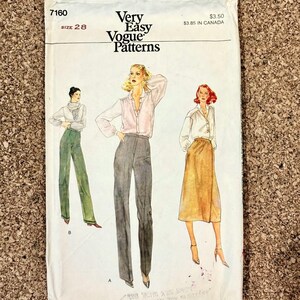 May include: Vogue Patterns sewing pattern envelope. The white envelope features illustrations of women's clothing designs, including blouses and pants. Text includes "Very Easy Vogue Patterns" and "Size 28". The envelope has a price tag of $3.50.