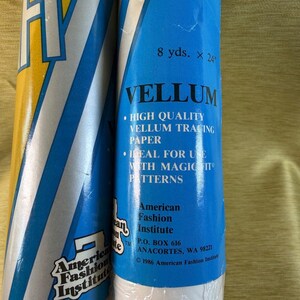 May include: A roll of high quality vellum tracing paper by American Fashion Institute. The blue packaging features the text 8 yds. x 24, VELLUM, HIGH QUALITY VELLUM TRACING PAPER, IDEAL FOR USE WITH MAGIC FIT PATTERNS, and American Fashion Institute.