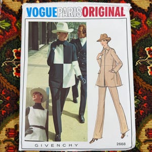 May include: A Vogue Paris Original sewing pattern envelope for Givenchy design 2668. The front features photographs of a two-tone black and white jacket and a white sleeveless top, alongside a tan line drawing of a jacket and trousers outfit.