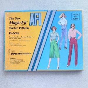 May include: Vintage AFI Magic-Fit Master Pattern for Pants. The box is a mix of blue, yellow, and white. The box features illustrations of women wearing pants in various styles. Text includes "The New Magic-Fit Master Pattern for Pants."