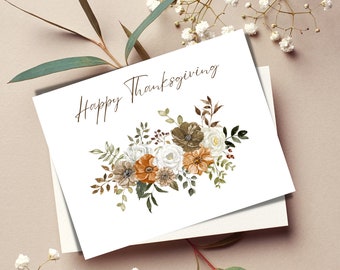 May include: A white card with the text "Happy Thanksgiving" in brown script. A watercolor illustration of a bouquet of flowers in shades of brown, white, and orange is below the text.