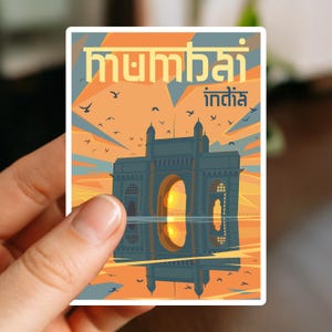 May include: A rectangular sticker featuring a stylized illustration of the Gateway of India in Mumbai. The image has a warm color palette with orange, blue, and yellow hues. The text "Mumbai India" is at the top.