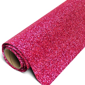 May include: A roll of vibrant hot pink glitter material featuring a dense, sparkling texture across the entire surface. The material is wound around a cylindrical cardboard core, showing a consistent, reflective finish throughout the sheet.
