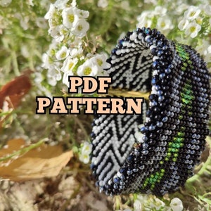 May include: A PDF pattern for a beaded bracelet with black, white, and green beads. The bracelet has a chevron pattern and is shown against a background of white flowers.