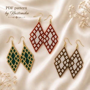 May include: Three pairs of diamond-shaped beaded earrings with gold-tone hooks. One pair features red and white beads, one pair features dark green and gold beads, and one pair features brown and white beads. Text reads: PDF pattern by Nastemika.