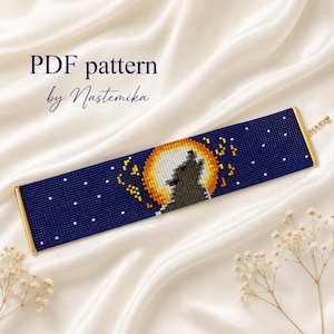 May include: A rectangular beaded bracelet featuring a dark blue background with a yellow moon and a black wolf silhouette. The text PDF pattern by Nastemika is visible. The bracelet has gold-toned metal end bars and a small chain clasp.