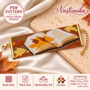 May include: A beaded bracelet featuring an open book design with a prominent yellow maple leaf, crafted in brown, orange, and white tones. The bracelet has gold-tone metal end bars, a lobster clasp, and an adjustable chain. Text includes PDF PATTERN, EVEN-COUNT PEYOTE, Nastemika, and dimensions of 4.8 cm width and 16 / 17.3 cm lengths.