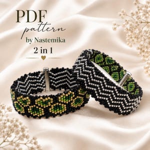 Peut inclure: Deux bracelets en perles présentant un motif PDF par Nastemika 2 en 1. Les bracelets sont fabriqués avec des perles noires, argentées et vertes dans un motif en chevron et circulaire, chacun fixé avec un fermoir cylindrique en métal argenté.