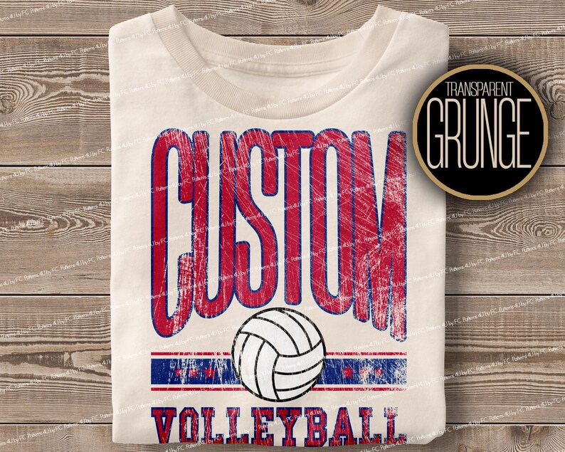 May include: A white t-shirt with a red, white and blue distressed graphic that says "CUSTOM VOLLEYBALL". The graphic includes a volleyball.