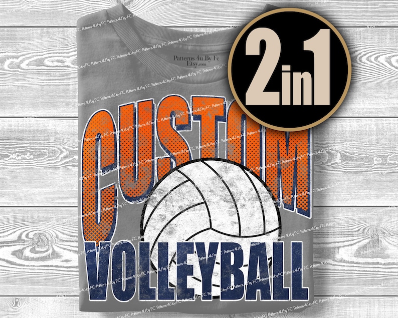 May include: Gray t-shirt with a volleyball graphic. The shirt features the words "CUSTOM VOLLEYBALL" in orange and navy blue, with a volleyball in the center. A black and gold circle with "2 in 1" is in the upper right corner.