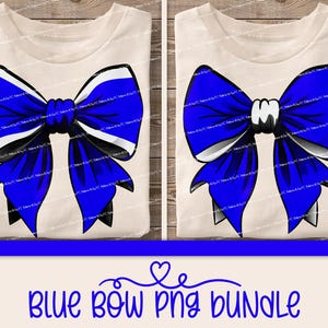 May include: Two white t-shirts with a blue bow design. The bow is a large, stylized bow with white stripes and a blue center. The bow is centered on the t-shirt and is the only design on the shirt.
