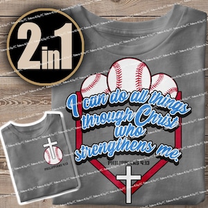 Pode incluir: Camiseta cinza com um gráfico de beisebol e o texto "Posso todas as coisas naquele que me fortalece." Uma camiseta menor mostra uma bola de beisebol e uma cruz. A imagem inclui o texto "2 em 1" e "Filipenses 4:13".