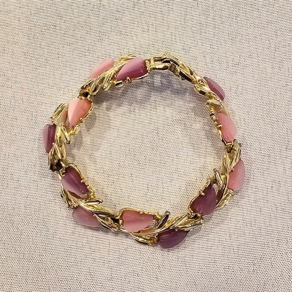 1950s vintage pink and purple lucite gold toned bracelet.
