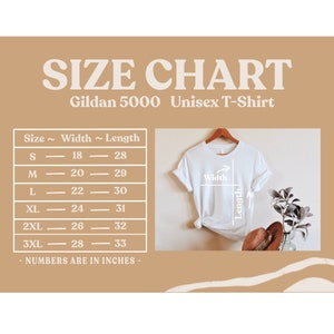 May include: Size chart for a Gildan 5000 unisex t-shirt. The chart shows the width and length in inches for sizes S, M, L, XL, 2XL, and 3XL. An image of a white t-shirt on a hanger shows how to measure width and length.