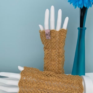 Hand knitted Wrist warmers. Knitted in Soft Merino yarn.