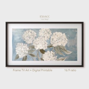 May include: A digital painting of white hydrangeas against a blue background. The painting is framed in a black frame and has the text "Frame TV Art + Digital Printable 16:9 ratio" at the bottom.