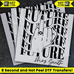 May include: White DTF transfers with a black graphic of a hand giving the middle finger, wearing a ring, and the word "FUTURE" repeated. The text "Mrs. Smith" is below the hand. The transfers are labeled "8 Second and Hot Peel DTF Transfers!"