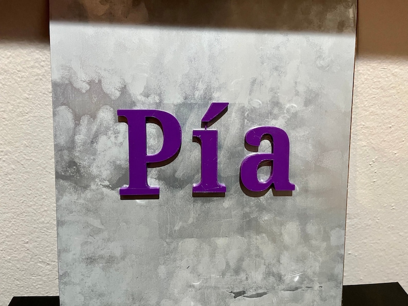 3d Printed Fridge Magnets With Custom Letters and Colors Used to Spell